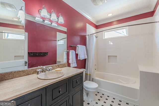 bathroom featuring shower / bath combo, crown molding, toilet, a wealth of natural light, and visible vents
