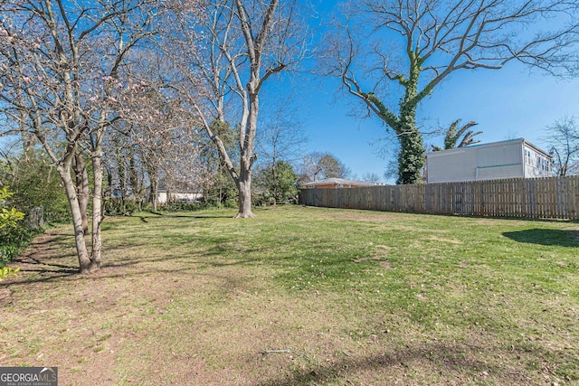 view of yard with fence