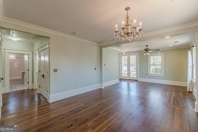 unfurnished living room featuring ceiling fan with notable chandelier, baseboards, and dark wood finished floors