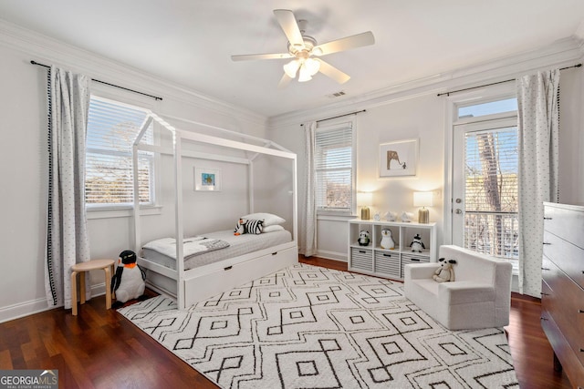 bedroom featuring ornamental molding, access to outside, visible vents, and wood finished floors