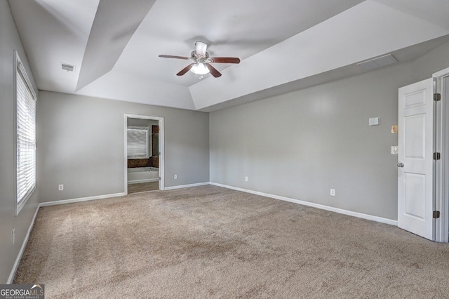 unfurnished room with baseboards, visible vents, ceiling fan, and carpet flooring