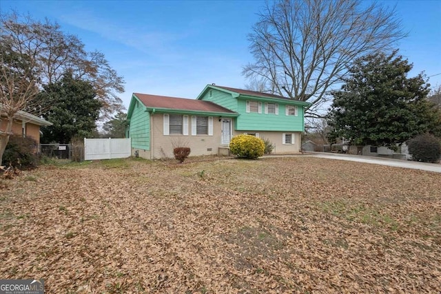 tri-level home with fence