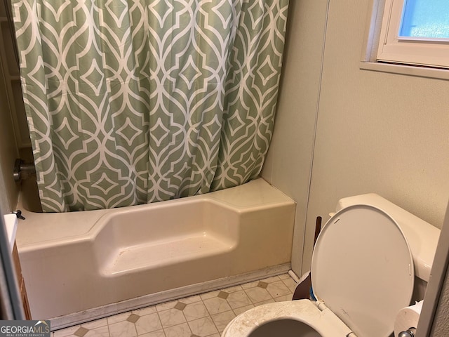 full bathroom featuring toilet