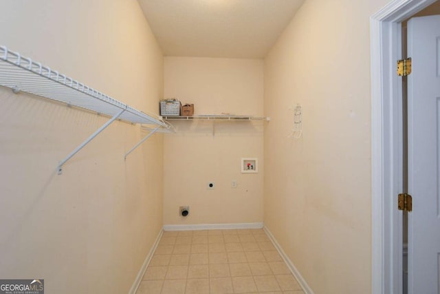 laundry room featuring washer hookup, laundry area, electric dryer hookup, and baseboards