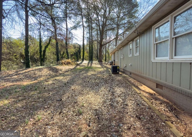 view of yard featuring central AC unit