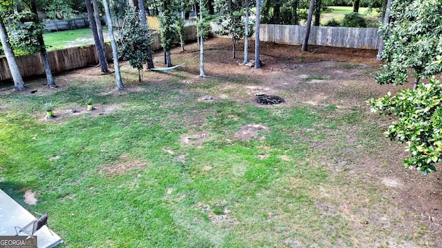 view of yard featuring a fenced backyard