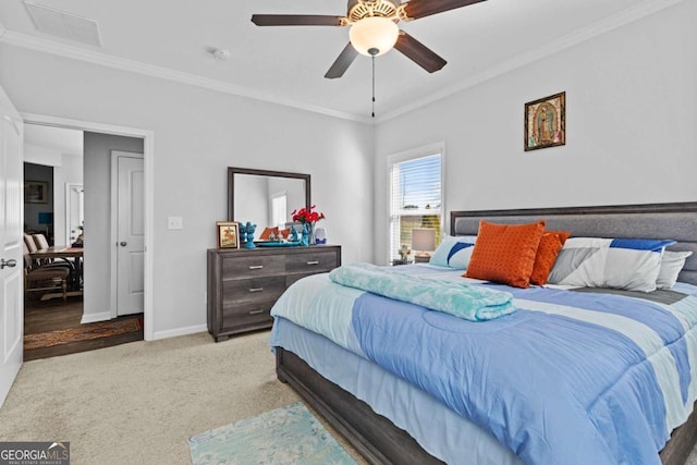 bedroom featuring ornamental molding, carpet flooring, ceiling fan, and baseboards