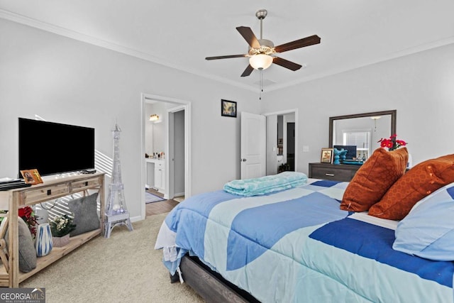 bedroom with baseboards, a ceiling fan, connected bathroom, ornamental molding, and carpet flooring