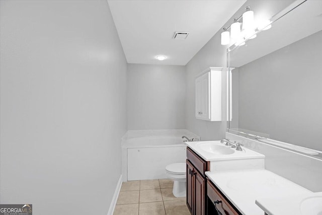 full bath with visible vents, toilet, tile patterned floors, a garden tub, and vanity