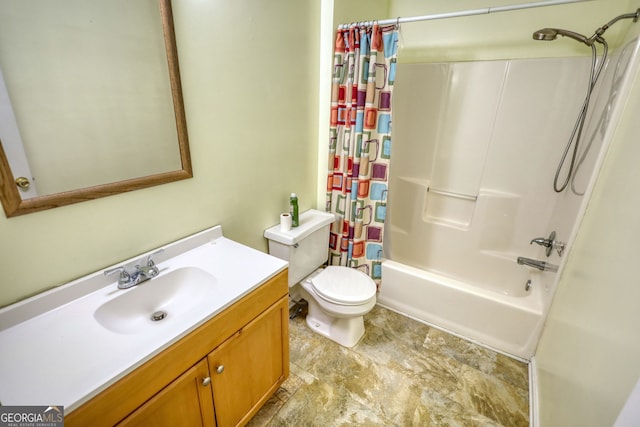 bathroom featuring shower / bath combo, vanity, and toilet