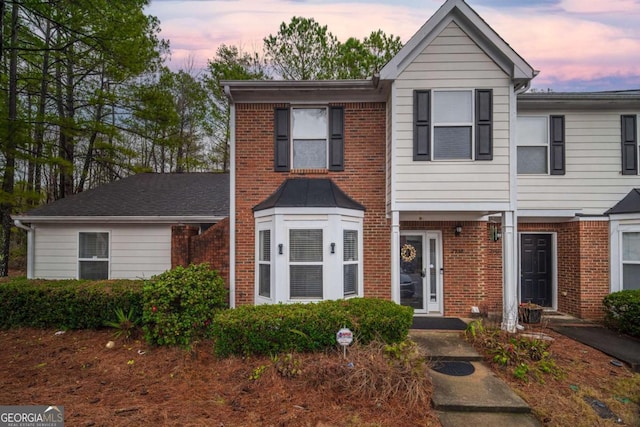 multi unit property featuring brick siding