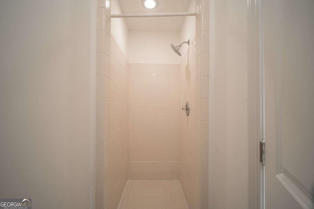 full bath featuring a stall shower