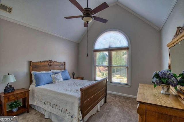 bedroom featuring crown molding, lofted ceiling, visible vents, a ceiling fan, and light carpet