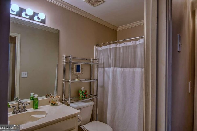 bathroom with crown molding, visible vents, toilet, vanity, and a shower with curtain