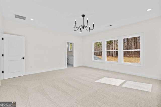 3636 Castoff Ct, Gainesville, GA 30506 - spare room featuring light carpet, baseboards, a chandelier, and recessed lighting