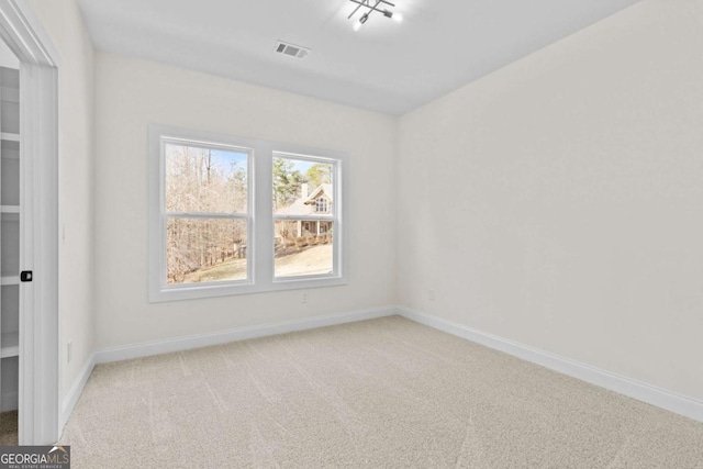 3636 Castoff Ct, Gainesville, GA 30506 - spare room with light colored carpet, visible vents, and baseboards