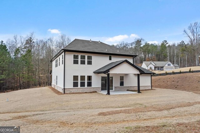 3636 Castoff Ct, Gainesville, GA 30506 - back of house with a patio area, a shingled roof, and brick siding