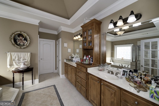 bar featuring light tile patterned floors, a tray ceiling, a sink, and ornamental molding