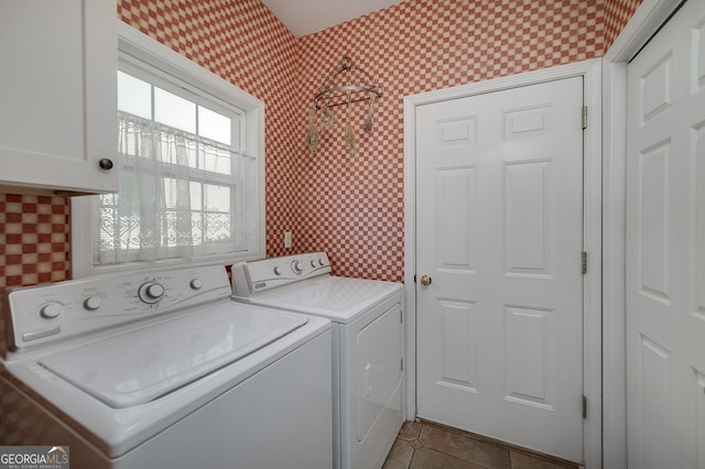 laundry room featuring separate washer and dryer, tile patterned flooring, cabinet space, and wallpapered walls