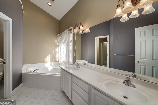 full bathroom featuring a garden tub, vaulted ceiling, a sink, and tile patterned floors