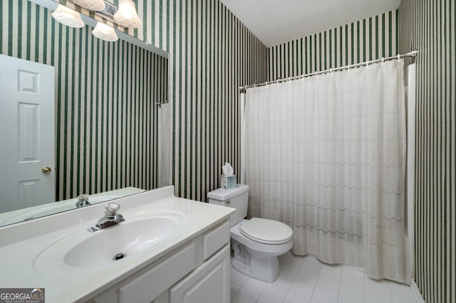 full bath featuring tile patterned floors, vanity, toilet, and wallpapered walls