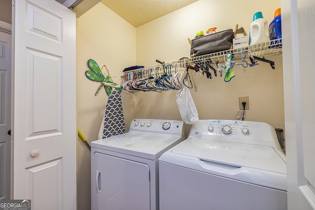 clothes washing area featuring laundry area and independent washer and dryer