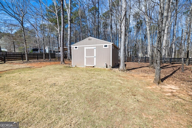 view of shed featuring a fenced backyard