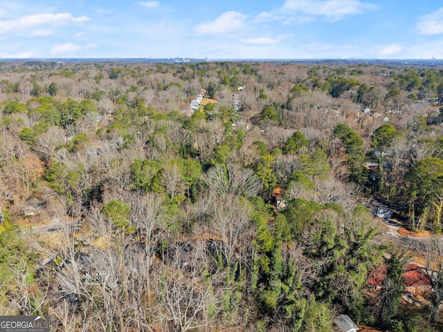 drone / aerial view with a view of trees