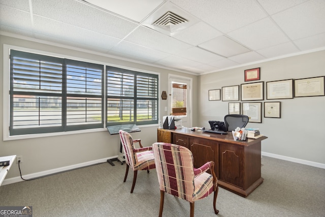 office area with carpet flooring, visible vents, baseboards, and a drop ceiling