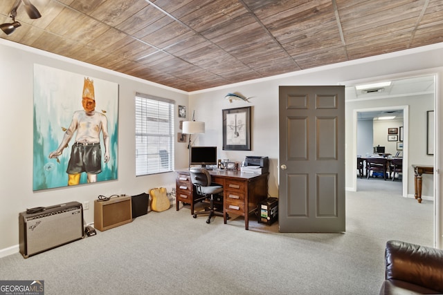 carpeted office space featuring ornamental molding, wood ceiling, visible vents, and baseboards