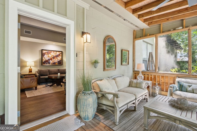 sunroom with plenty of natural light and visible vents