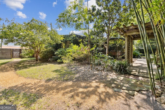 view of yard featuring fence