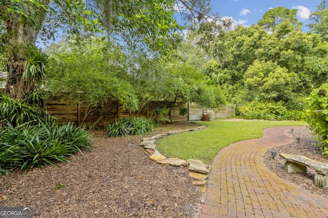 view of yard with fence