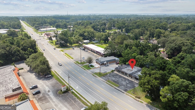 aerial view with a wooded view