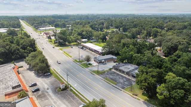 bird's eye view featuring a view of trees