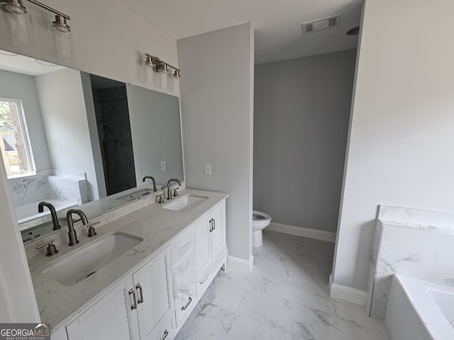 bathroom with marble finish floor, baseboards, visible vents, and a sink