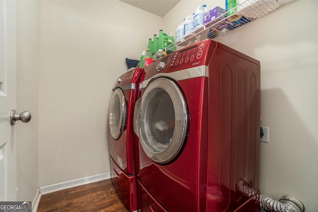 5987 Westchase St, Atlanta, GA 30336 - laundry room featuring laundry area, baseboards, washing machine and clothes dryer, and wood finished floors