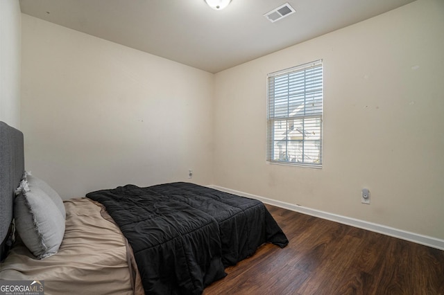 5987 Westchase St, Atlanta, GA 30336 - bedroom with baseboards, visible vents, and wood finished floors