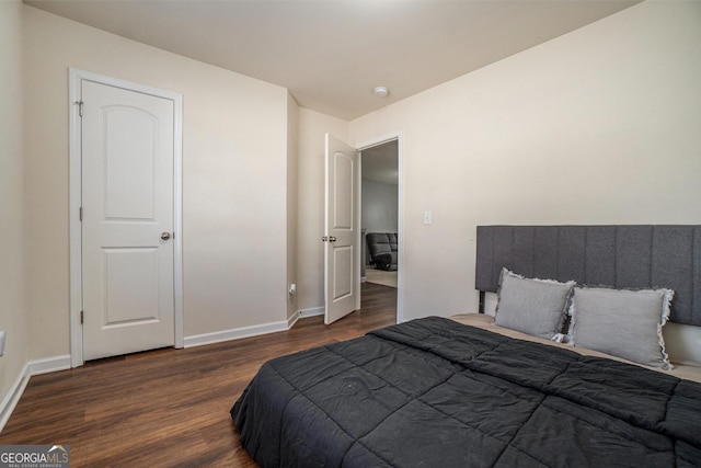 5987 Westchase St, Atlanta, GA 30336 - bedroom with baseboards and wood finished floors
