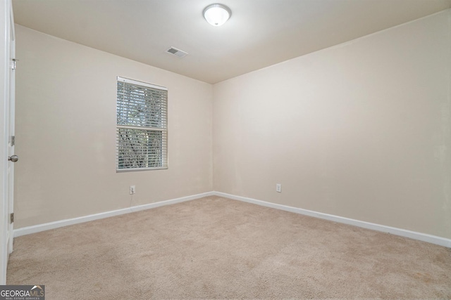 5987 Westchase St, Atlanta, GA 30336 - empty room featuring light carpet, visible vents, and baseboards