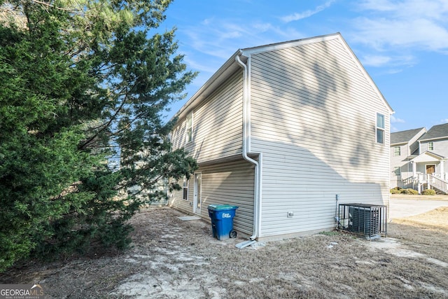 5987 Westchase St, Atlanta, GA 30336 - view of home's exterior featuring central AC