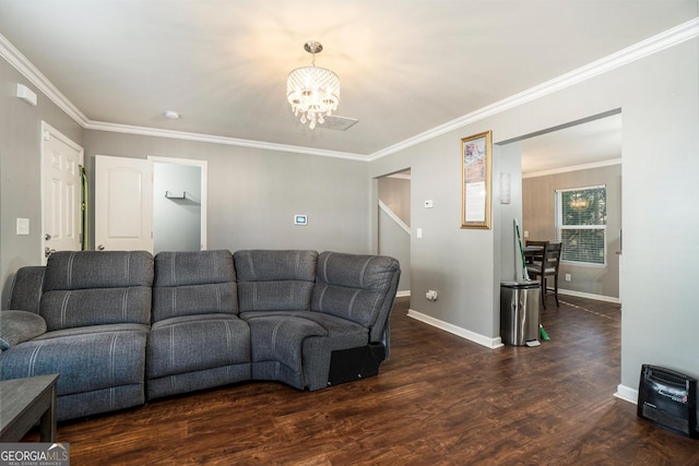 5987 Westchase St, Atlanta, GA 30336 - living room with an inviting chandelier, crown molding, baseboards, and wood finished floors