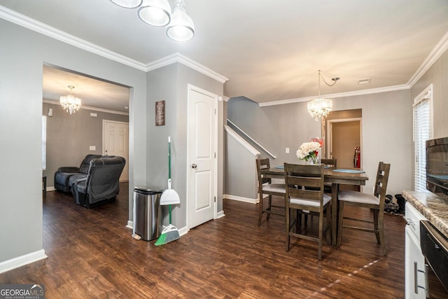 5987 Westchase St, Atlanta, GA 30336 - dining room with baseboards, ornamental molding, a notable chandelier, and wood finished floors