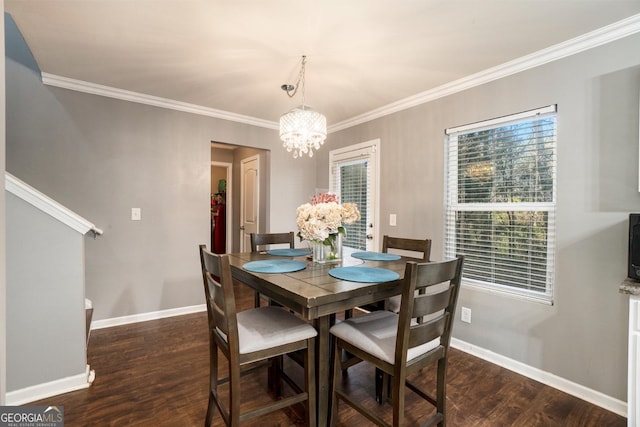 5987 Westchase St, Atlanta, GA 30336 - dining room featuring an inviting chandelier, baseboards, dark wood-style flooring, and ornamental molding