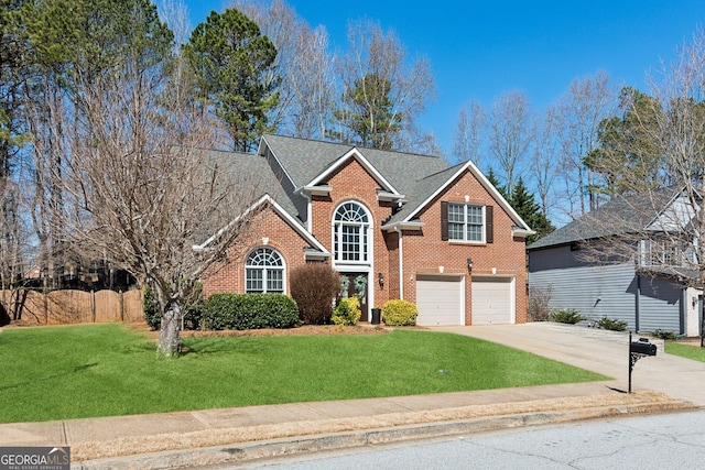 traditional home with brick siding, roof with shingles, a front yard, a garage, and driveway