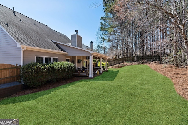 view of yard with a fenced backyard and a patio