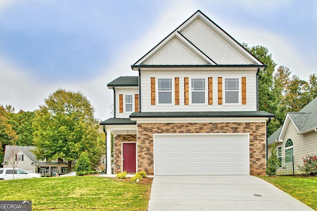 view of front of house with concrete driveway, stone siding, an attached garage, a front lawn, and board and batten siding