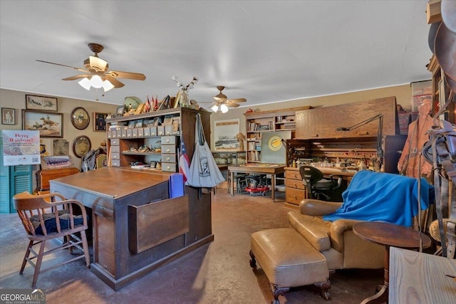 living area with a ceiling fan