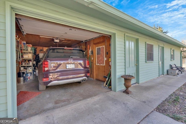 garage featuring a garage door opener