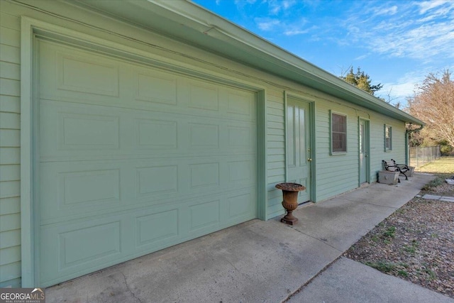 garage with driveway